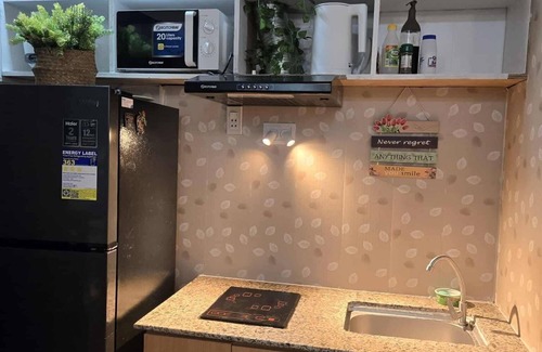 Digos City Apartment | Summers Cozy studio in delightful Digos City with AC