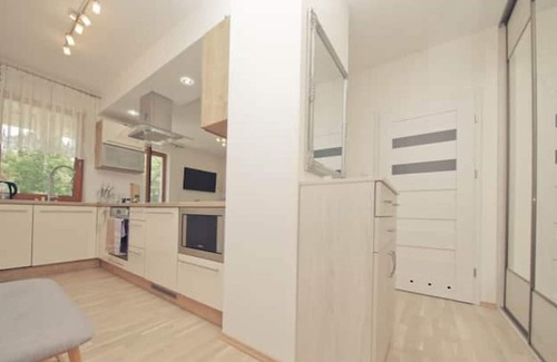 Elk House | Sunny apartment with terrace right in the woods