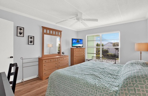 Palm Harbor Condo | Sunny Oasis Scape