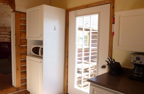 Killaloe Cottage | Sunny Peaceful Log Cabin SW Exposure, Sandy Beach and Sunsets