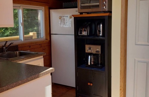 Killaloe Cottage | Sunny Peaceful Log Cabin SW Exposure, Sandy Beach and Sunsets