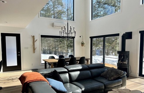 Mauricie Ski Chalet | Sunny, spacious lakeside chalet.
