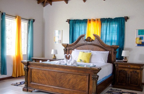 La Plaine Villa | Sunrise Bliss Villa w/Hot Tub, King Bd+Mountain and Ocean View