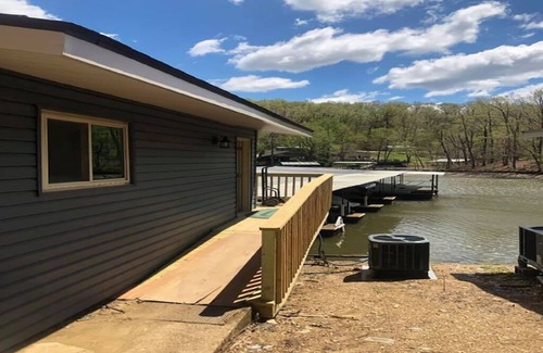 Sunrise Beach Cabin | Sunrise Shores Cabin 9 Lake Front with 2 POOLS! + WOOF