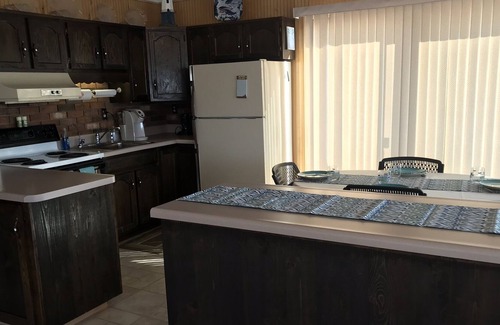 Town of Ledyard Cottage | Sunset Haven, lakefront on Cayuga Lake w/ Hot Tub, Waterslide & Boat Lift