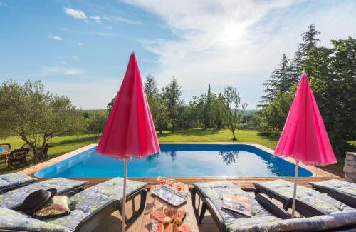 Topid House | Sunset holiday home with pool and large, mature garden