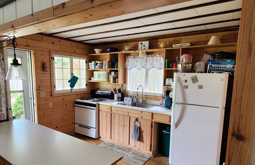 Cheboygan County Cottage | Sunset Shores 2 Bedroom 1 Bath Burt Lake Cottage- Sleeps 8