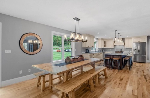 Gilford House | Sunset Veranda with peekaboo views of Winnipesaukee!