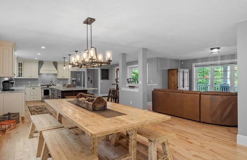 Gilford House | Sunset Veranda with peekaboo views of Winnipesaukee!