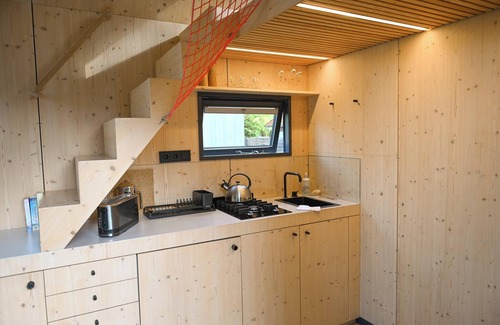 Schortens House | Sustainable Tiny House Pioneer by the natural bathing lake in Friesland