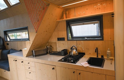 Schortens House | Sustainable Tiny House Pioneer by the natural bathing lake in Friesland