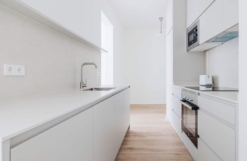 Golden Triangle of Art Apartment | Sweet Huertas Cortes 3BR w/Doorman, Balcony, A/C, by Blueground