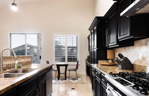 Tatum Ranch House | Swimming and games at Quail Run, nearby Desert Ridge entertainment.