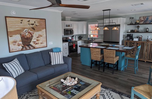 Saint James City Cottage | Tangerine Dream Tropical Pool and Canal Retreat