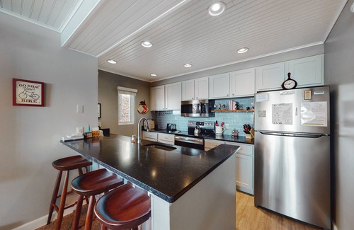 Maple City Condo | Tasteful Glen Arbor condo with beautiful Lake Michigan views, deck & fireplaces