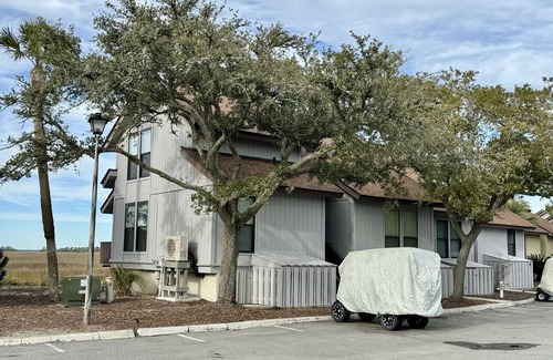 Saint Helena Island Villa | Tennis Courts in front and the ever changing Marsh in back. Golf cart included.