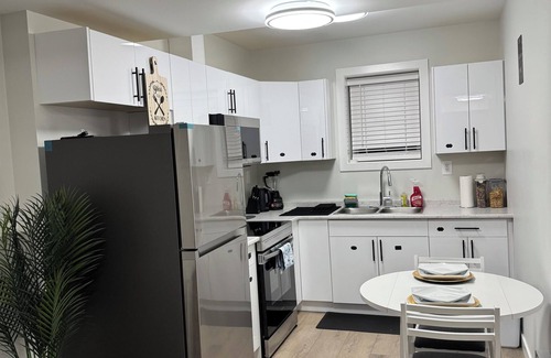 Saskatoon Apartment | Terracotta Luxury Suite- Your grounding oasis!