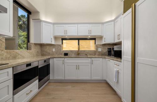 Beach Barber Tract House | The 357 Beach Pad, Renovated, Refined, Steps from the Surf!