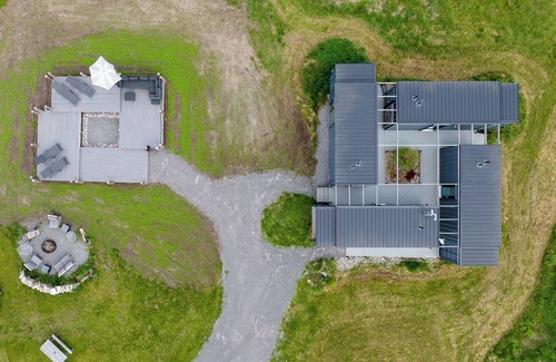 Gilbert Mills House | The Acres at High Shore - Shipping Container Suites & Stock Tank Pool