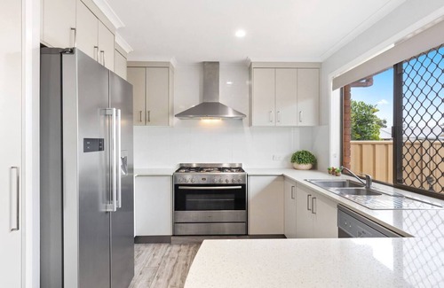 Urangan House | The Aussie Classic Poolside Living by the Marina