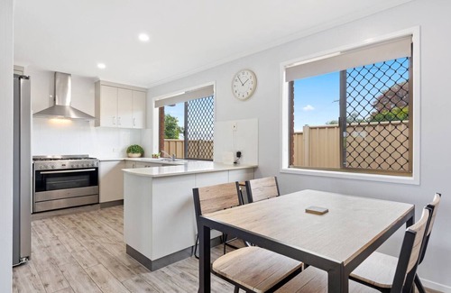 Urangan House | The Aussie Classic Poolside Living by the Marina