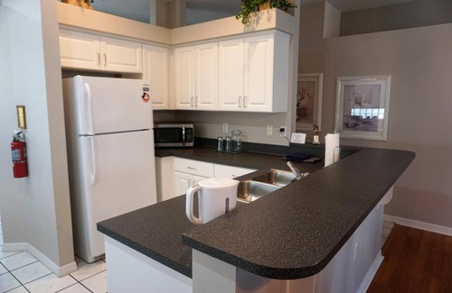 Sunset Lakes House | The Blue Flamingo Lake House Near Disney