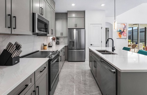 Florida Center House | The Breathtaking | NEW Villa w/Luxe Suites, Pool, Game Loft - Mins to Universal