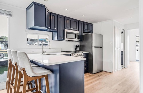 Celina Boat Rental | The Castaway Houseboat 53' - Smallest Houseboat, 3 bedrooms, waterslide, covered rooftop lounge area