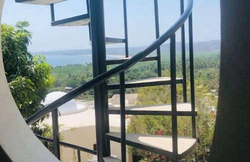 La Manzanilla Apartment | "The Dharma room" a bedroom with a fantastic view.n