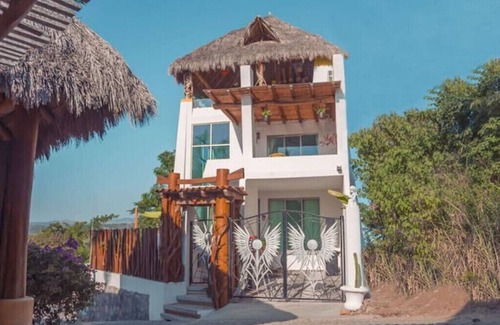 La Manzanilla Apartment | "The Dharma room" a bedroom with a fantastic view.n