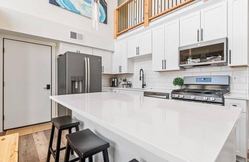 Whitefish Condo | The Eagle's Nest at The Quarry! Stunning home with Clubhouse, Communal Pool, and Hot Tub access