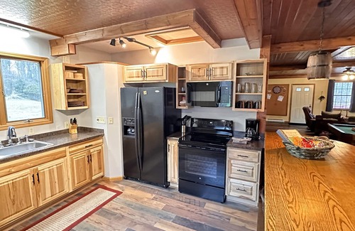 Austinburg Cabin | The Game Cabin at Rustic River Retreats-fun wine country getaway!