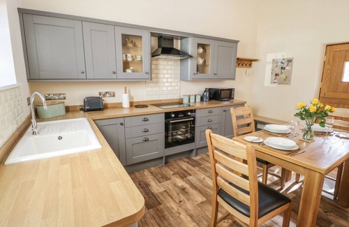Scawton Cottage | THE HAYLOFT, with a garden in Husthwaite