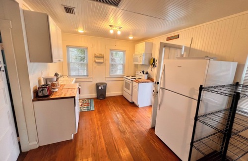 Bradenton Beach Cottage | The Hemingway-Key West Style Cottage. Million Dollar Waterfront.dock.beach