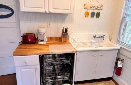 Bradenton Beach Cottage | The Hemingway-Key West Style Cottage. Million Dollar Waterfront.dock.beach