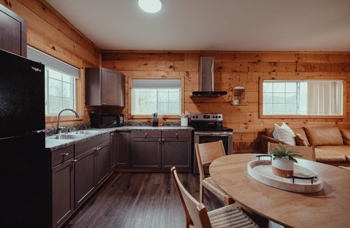 South Bloomingville Cabin | The Hideout - Escape to The Hideout in Hocking Hills, OH! This cozy, pet-friendly cabin offers a private deck by Pine Creek, just minutes from hiking, waterfalls, and caves. Perfect for up to 4 guests. Book your nature-filled getaway today!