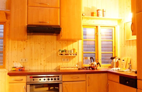 Suderburg House | The holiday home "Ortheide 69" is located in a forest settlement with large trees.