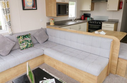 Kidwelly House | THE JUNGLE NOOK, pet friendly, with pool in Kidwelly