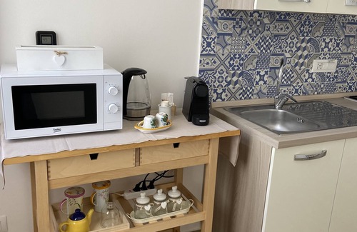 Santa Lucia Apartment | The Little House at 41. Bright apartment with modern and functional furnishings.