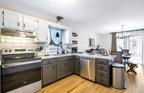 Wichita House | The Lodge is a spacious 4 bed, 2.5 bath home, styled with mountain/lodge decor