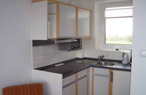 Horum Apartment | The Möwe for 2 people with a view of the inland with afternoon sun until the evening