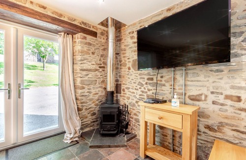 Llanybri Cottage | THE OLD CORN STORE, family friendly, with open fire in St Clears