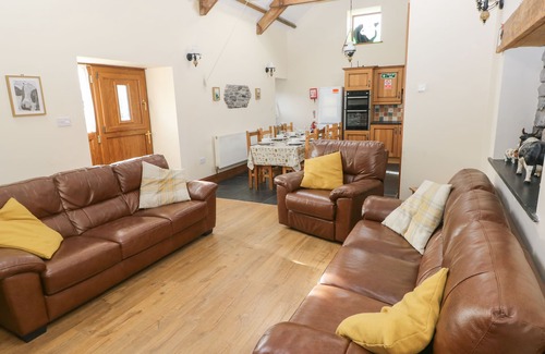 Llanybri Cottage | THE OLD COW BARN, pet friendly, with a garden in Laugharne