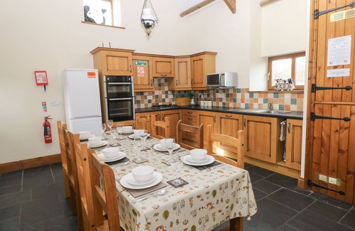Llanybri Cottage | THE OLD COW BARN, pet friendly, with a garden in Laugharne