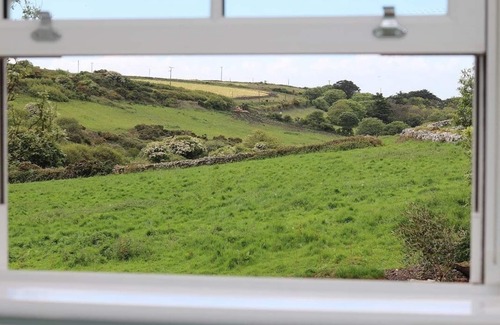Penzance Cottage | THE OLD FORGE, ST JUST, pet friendly, with hot tub in St Just