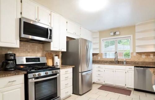 Sheffield Park House | The Olive Door Oasis - Large house in a quiet neighborhood with yard and grill!