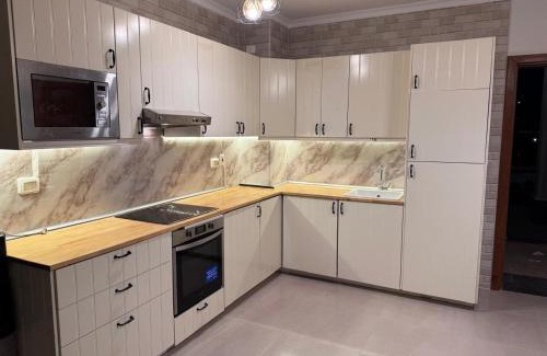Ad-Dab'ah Apartment | The Pearl Chalet Gaia Resort Ground floor with garden