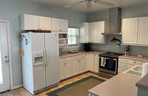Perdido Beach House | "The Perfect Getaway" w/boat dock & water access in front & in back of house!