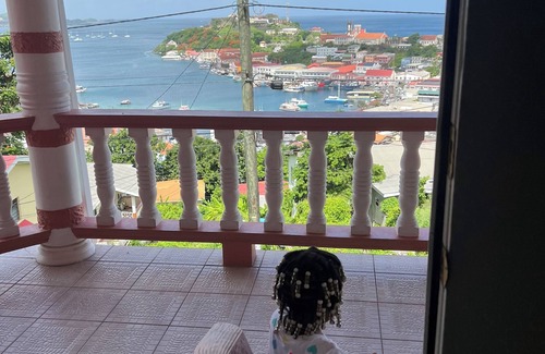 St. George's Apartment | The Pink House Overlooking with the Carenage. Features 2 Person Jacuzzi Tub.