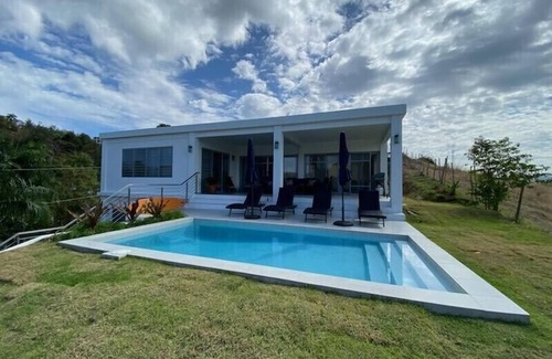 Puntas House | The Ranch At La Joya is a three bedroom modern farm house at Tres Palmas Estates